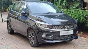 🚗. Tata Tiago – Budget Hatchback for Rent